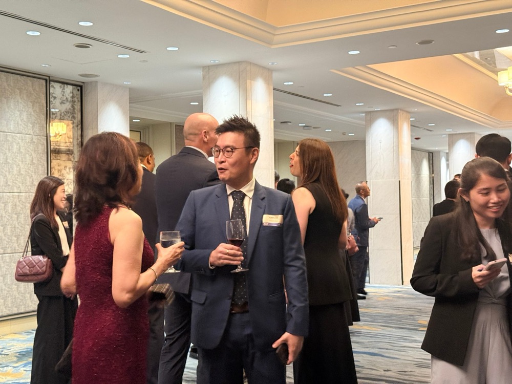 Attendees networking at an event using NookPass
